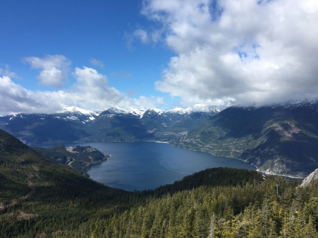 View over Howe Sound, forested mountains and water near Squamish, British Columbia.