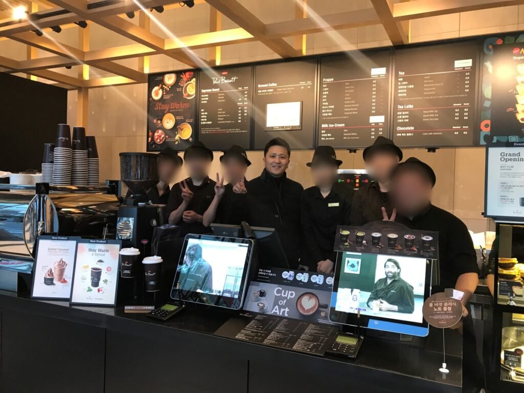 JW with the team at the opening of the 103rd Paul Bassett location in Korea in 2017.