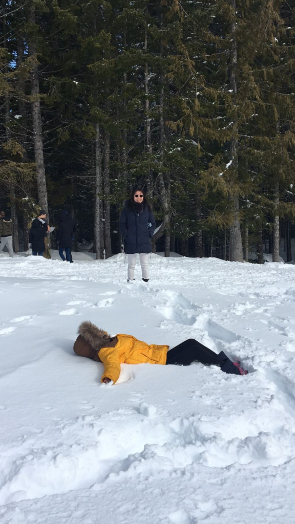 Mother and daughter enjoying the snow outdoors at the Sea to Sky Gondola in Squamish in 2018.